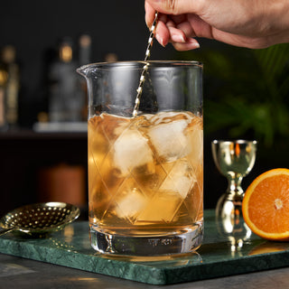 FACETED LEAD-FREE CRYSTAL BARWARE - Geometric cuts give this sturdy mixing glass a classic look. Stirred cocktails often bring out the subtleties of your liquor--pair this mixing glass with a twisted bar spoon and taste the difference.