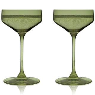 SAGE COUPE COCKTAIL GLASSES – This set of sage green colored cocktail coupes will enhance your shaken cocktails. A sleek silhouette with an angled bowl gives these colored coupe glasses a modern look, while the green hue recalls vintage glassware.