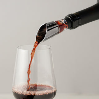 INTERNAL AIR BLENDING HELIX AERATES AS YOU POUR - This handy wine pourer has a gunmetal finish and is made of stainless steel, acrylic, and rubber for a drip-free pour. Easy to clean and use, it eliminates bitter tannins from your favorite Pinot Noir.