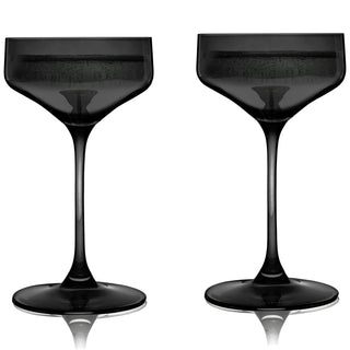 SMOKE COUPE COCKTAIL GLASSES – This set of smoke gray colored cocktail coupes will enhance your shaken cocktails. A sleek silhouette with an angled bowl gives these colored coupe glasses a modern look, while the gray hue recalls vintage glassware.
