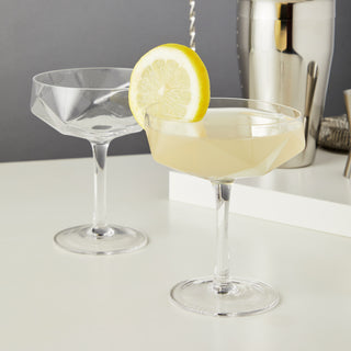 SPARKLING LEAD-FREE CRYSTAL – This beautiful lead-free crystal martini glass set is crafted for a high-end sipping experience. Timeless elegance and thoughtful details make this barware perfect for serving up your finest martini.