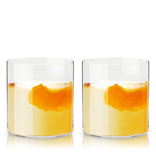 MINIMALIST CRYSTAL DOF GLASS SET – These cocktail glasses are the epitome of elevated simplicity. Exquisitely thin walls make the glass seem to vanish when you pour your liquor, providing a perfect view of your drink and preventing heat transfer.
