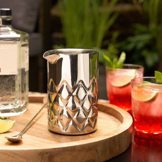 DURABLE STAINLESS STEEL BARWARE - With its sturdy stainless steel construction, this mixing glass is made to last. A double-walled design helps keep your drinks chilled, while geometric accents are a nod to the cut-glass designs of crystal glassware.