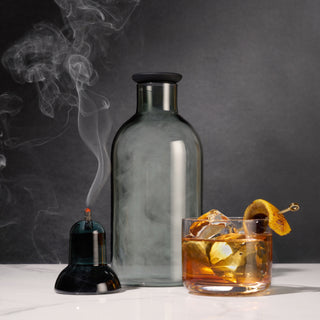 EASY WHISKY SMOKER KIT WITH CARAFE AND RECIPES - This cocktail or bourbon smoker kit includes a smoke-tinted glass carafe, stand, silicone stopper, 20 smoking pellets, and an instruction and recipe booklet to get you started.