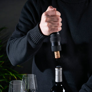 CO2 WINE OPENER WITH COMPRESSED GAS - The air pressure wine opener uses compressed gas to effortlessly extract the cork from your wine bottle. Just insert the hidden needle and push on the wine bottle opener cartridge to uncork with ease.