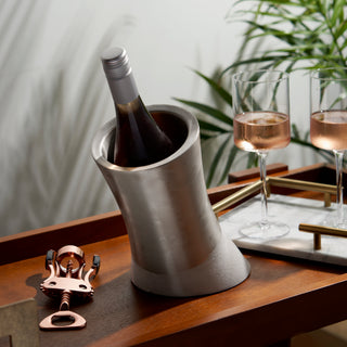 DURABLE STAINLESS STEEL BOTTLE CHILLER - Forget your fragile glass or plastic decorative wine holders and impractical ice buckets. This insulated wine chiller is made of stainless steel with a timeless polished finish that complements your bar tools.