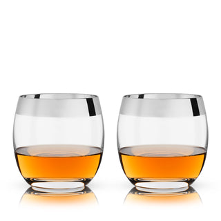 MAD MEN INSPIRED ROLY-POLY GLASS - This set of chrome rim whiskey tumblers is inspired by the iconic “roly-poly” glasses made famous again by the popular TV show. The smooth curves and chrome detail make these glasses a stunning addition to your home bar.