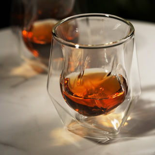 DOUBLE WALLED DESIGN REGULATES TEMPERATURE - Our double walled whiskey glasses protect your liquor for the heat from your hand, keeping your whiskey colder without needing more ice. The tulip shape of the internal vessel focuses your whiskey’s aromas.