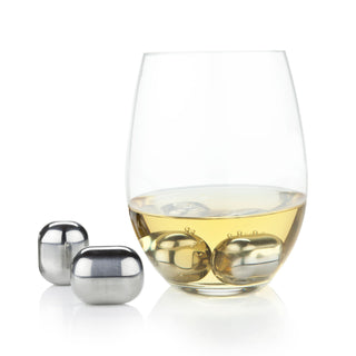 SIP IN STYLE WITH STAINLESS STEEL ICE CUBE SPHERES - Update your cocktail presentation with these glacier globes. Designed to chill your wine or drinks without watering them down, these wine globes will enhance your sipping experience.