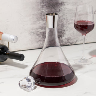 CONTEMPORARY SILHOUETTE – In this classically styled wine decanter, smooth crystal creates a broad base for optimal aeration of one standard bottle, before slanting inward to form a slim pour spout accented with chrome for smooth, eye-catching pouring.