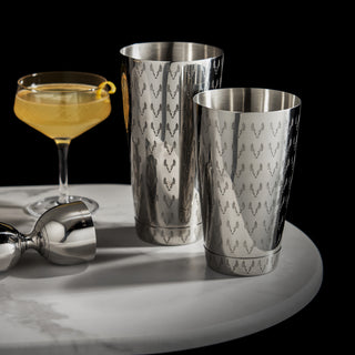 STAINLESS STEEL BOSTON COCKTAIL SHAKERS - Perfectly weighted and balanced, this set of two cocktail shaker tins is crafted from durable stainless steel with a unique staghead pattern etched into the surface for style and textured grip. 18 oz and 28 oz. 