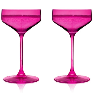 BERRY COUPE COCKTAIL GLASSES – This set of berry colored cocktail coupes will enhance your shaken cocktails. A sleek silhouette with an angled bowl gives these colored coupe glasses a contemporary look, while the pink hue recalls vintage glassware.