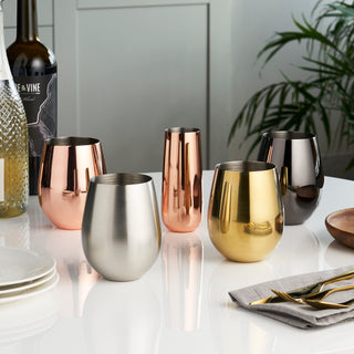 STAINLESS STEEL WITH COPPER FINISH - Made from sturdy stainless steel, these metal tumblers are covered in a luxurious copper finish. Bring a touch of modern luxe to your home decor with this copper wine glass set.
