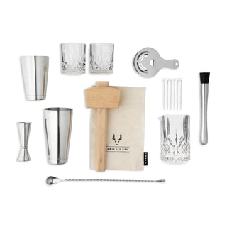 ULTIMATE BAR TOOL SET - This barware set includes a Boston shaker tin set, double jigger, muddler, mixing glass, Hawthorne strainer, twisted bar spoon, 2 crystal old fashioned glasses, Lewis ice bag and wooden mallet, and 6 silver drink picks.