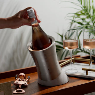 DURABLE STAINLESS STEEL BOTTLE CHILLER - Forget your fragile glass or plastic decorative wine holders and impractical ice buckets. This insulated wine chiller is made of stainless steel with a timeless polished finish that complements your bar tools.