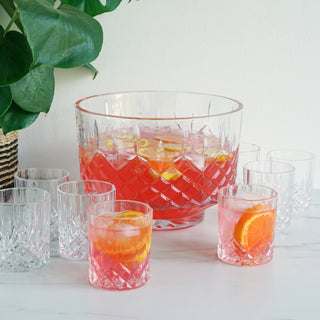INCLUDES 8 9 OZ CRYSTAL COCKTAIL GLASSES - This punch bowl is crystal clear to perfectly show off cocktail ingredients within. It comes with 8 stunning cut crystal rocks glasses perfect for serving classic cocktails or party punch. Dishwasher safe.
