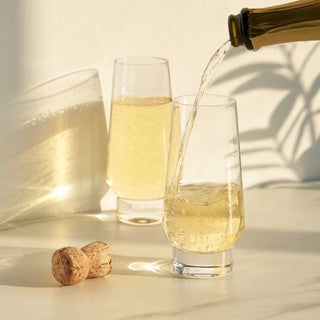 PERFECT FLUTE GLASSES FOR CHAMPAGNE COCKTAILS – A 9.5 oz. capacity makes these stemless flutes perfect for a celebratory glass of bubbly or a classic Champagne cocktail. The modern footed shape and weight of the glass makes every sip feel luxurious.