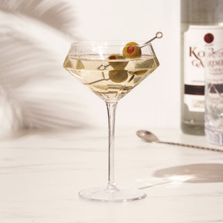 SPARKLING CRYSTAL GLASSWARE SET – This beautiful lead-free crystal martini glass set is crafted for a high-end sipping experience. Timeless elegance and thoughtful details make this tall martini glass set perfect for serving up your finest martinis.