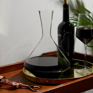 CONTEMPORARY ANGLED STYLE – In this radiant, classically styled wine decanter, angular crystal creates a broad base for optimal aeration of one standard bottle, before slanting inward to form a slim pour spout for smooth pouring.