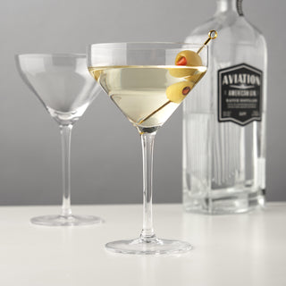 SPARKLING LEAD-FREE CRYSTAL – This beautiful lead-free crystal martini glass set is crafted for a high-end sipping experience. Timeless elegance and thoughtful details make this barware perfect for serving up your finest martini.
