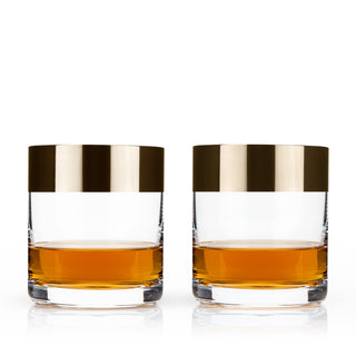 MAD MEN INSPIRED GLASS - This set of two bronze rim whiskey tumblers is inspired by glasses featured in the popular television show. Add mid-century panache to your home bar or office. 8 ounces capacity suits neat pours or cocktails.