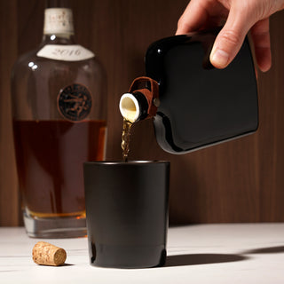 BLACK HIP FLASK MADE OF CERAMIC - Both classy and classic, this handmade flask is fun to drink out of and a good conversation piece. Ceramic is better for drinking whiskey, liquor, or cocktails than stainless steel, and the cork completes the look.
