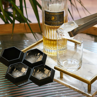 DIAMONDS ARE A DRINK’S BEST FRIEND - Drinks benefit from large ice. Large cubes are great in cocktails, juice, and tea—they melt slowly and dilute your drink less. This diamond ice cube tray makes perfect ice for bourbon, scotch, or whiskey on the rocks.
