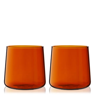 ON TREND COLORED GLASSWARE - Colorful glassware has made a comeback and is here to stay. Combining a timeless, vintage amber tone  with a minimalist silhouette, this set of amber cocktail glasses bring a unique look to any decor style.