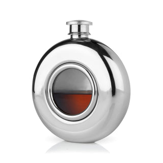 ROUND FLASK WITH WINDOW AND SCREW TOP - Fill this hip flask with 5 oz. of your favorite liquor. This shiny silver flask has a matching screw-on lid for a secure seal and a gorgeous glass porthole so you can monitor your drink levels. 