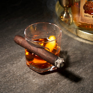 CIGAR HOLDING GLASS DOUBLE OLD FASHIONED TUMBLER - We recommend that if you are sipping chilled or iced liquid, that you fill this glass to just below the side mounted cigar rest holder. This helps avoid condensation building up and affecting your cigar.