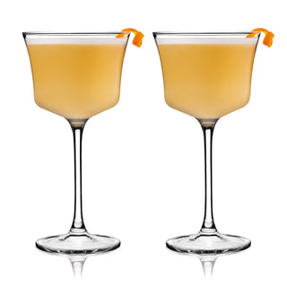 COUPE GLASSES FOR CONNOISSEURS - This classic whiskey sour glass makes a refined addition to an at-home bar set or kitchen. Arguably a barware essential, this set of stemmed cocktail glasses is perfect for drinks served up. Care: Dishwasher safe.
