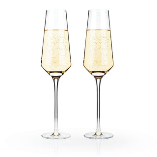TWO STEMMED CHAMPAGNE GLASSES – This beautiful pair of champagne glasses will enhance your finest sparkling vintages. Crafted to showcase any sparkling wine, this gorgeous stemmed glassware set will turn any beverage into a celebration.