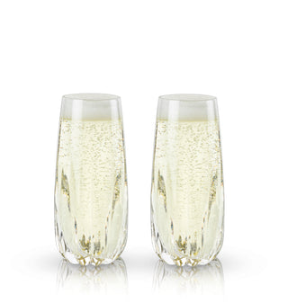 TWO STYLISH CACTUS-INSPIRED CHAMPAGNE GLASSES – This beautiful pair of wine glasses recalls the elegant curves of the San Pedro cactus. Crafted for champagne, this gorgeous glassware stands out from the crowd.