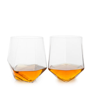 MID-CENTURY CRYSTAL GLASS SET – This beautiful pair of cocktail glasses has a faceted base for a uniquely modern look. These whiskey tumblers look great on a bar cart, but these glasses truly shine with a double pour of Scotch or margarita on the rocks.