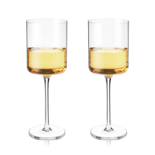 TWO STEMMED WHITE WINE GLASSES – This beautiful pair of wine glasses will enhance your finest vintages. Crafted with buttery white wines like Chardonnay or citrusy Pinot Gris in mind, this gorgeous glassware is perfect for crisp wine profiles.
