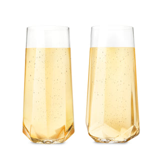 TWO FACETED CHAMPAGNE GLASSES – This beautiful pair of champagne glasses will enhance your finest sparkling vintages. Crafted to showcase any sparkling wine, this gorgeous glassware will turn any beverage into a celebration.