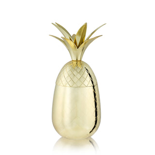 GOLD PINEAPPLE COCKTAIL TUMBLER - Enjoy Mai Tais out of this gorgeous gold pineapple. Complete with etched details and a lid crowned with delicate fronds, it’s a stunning statement piece for serving any cocktails.