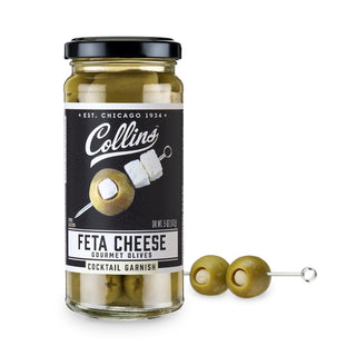 FETA CHEESE OLIVES – Discover a gourmet jar of hand-packed Greek olives. Bold and tangy, these olives are perfect for adding a Mediterranean vibe to any cocktail or salad.