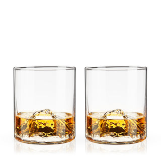 MOUNTAIN CRYSTAL WHISKEY GLASSES – Clear, smooth walls show off the majestic mountain peaks nestled at the bottom of these unique tumblers. Eye-catching and useful, this dimensional glass set pays homage to the mountains of the Pacific Northwest.
